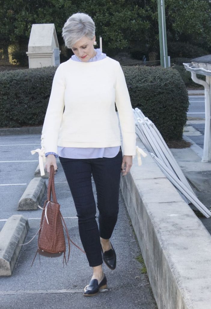 ann taylor grommet sweater, striped ruffled shirt, denim, everlane loafers