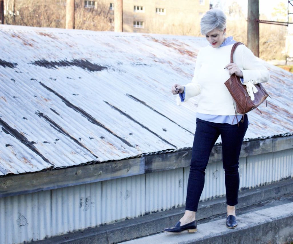 ann taylor grommet sweater, striped ruffled shirt, denim, everlane loafers