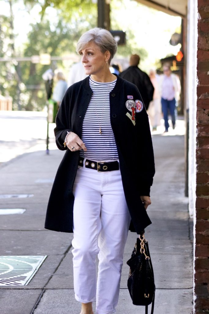 black cardigan, white denim, black mules