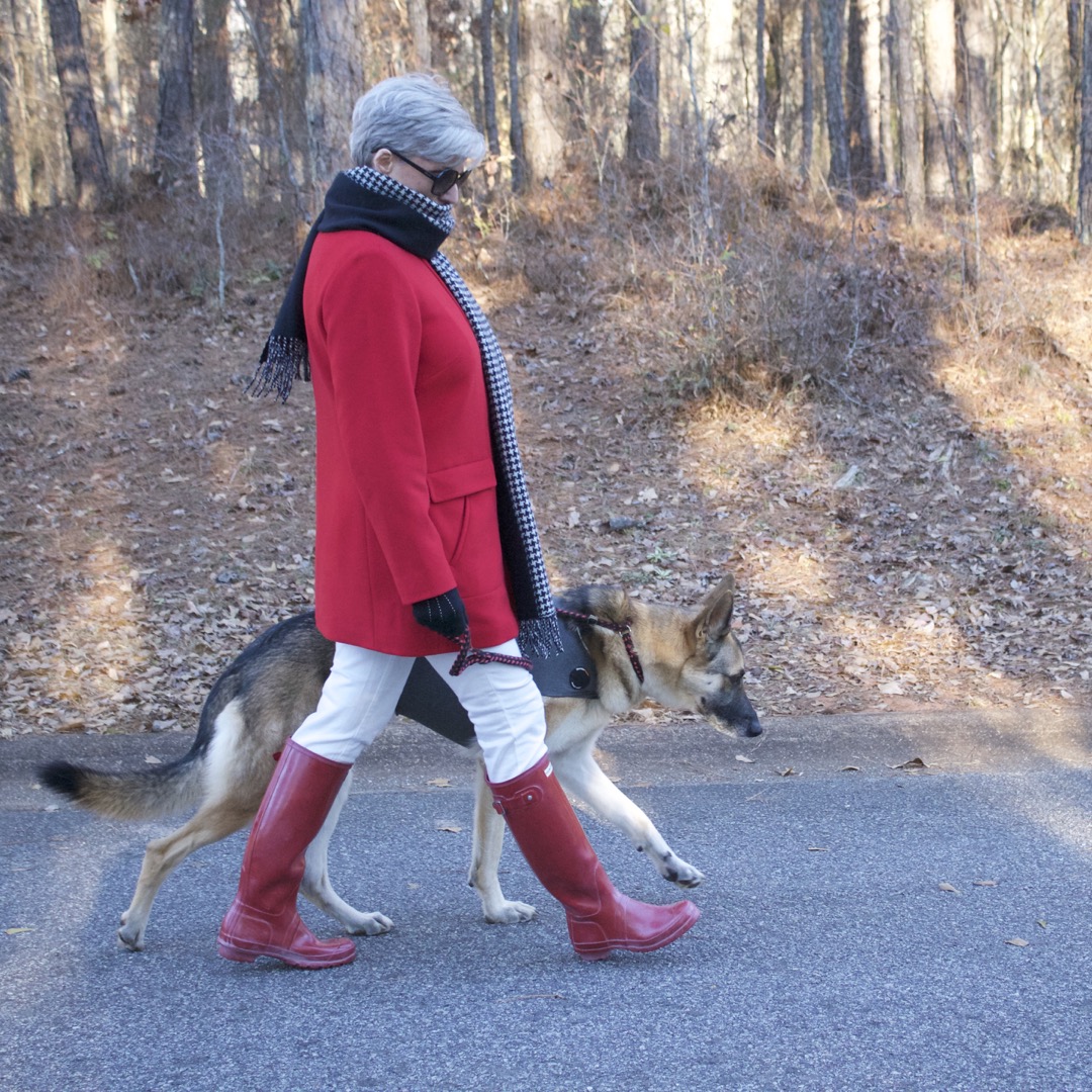 red stadium coat, striped crewneck, white denim, red hunter boots, houndstooth cashmere scarf