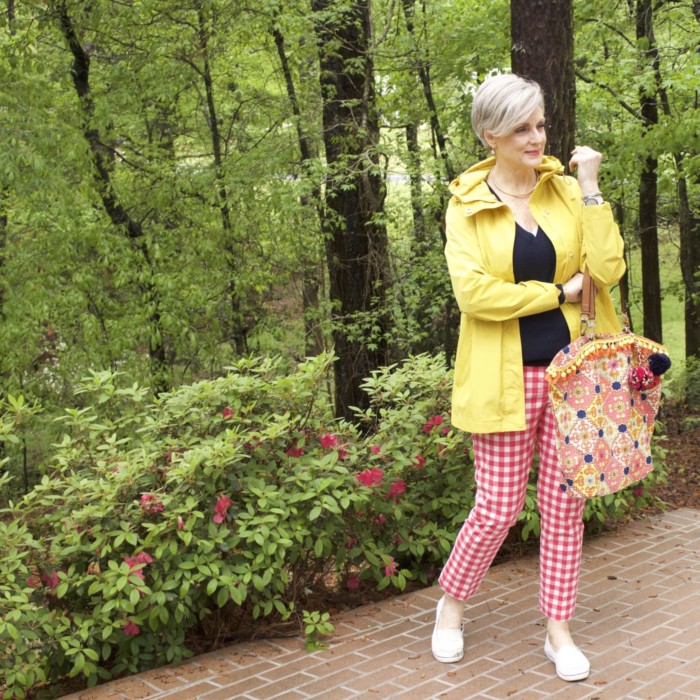 marks and spencer yellow slicker, boden gingham pants, boden cashmere sweater, sperry sneakers, trina turk tote, over 50 fashion blogger