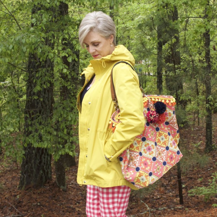 marks and spencer yellow slicker, boden gingham pants, boden cashmere sweater, sperry sneakers, trina turk tote, over 50 fashion blogger