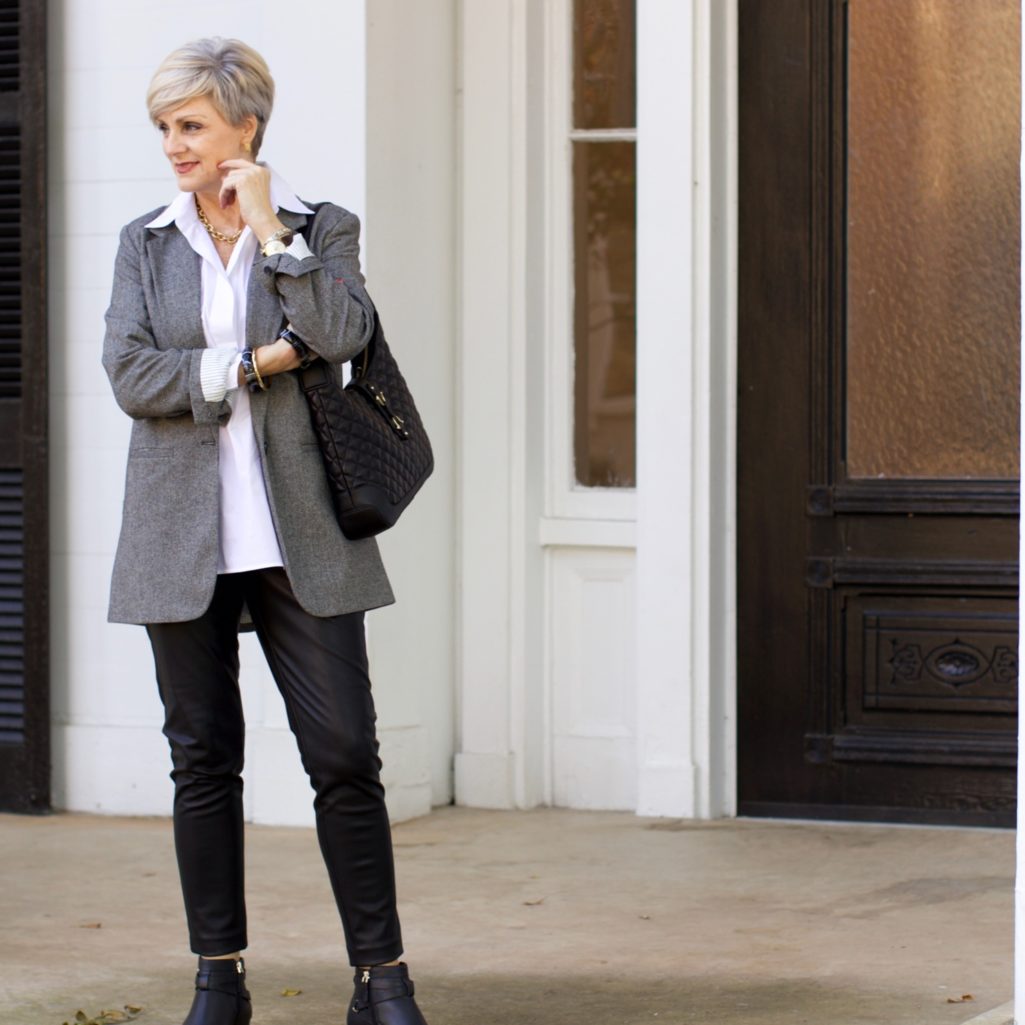 beth at Style at a Certain Age wears faux leather leggings, white shirt, boyfriend blazer, and black booties