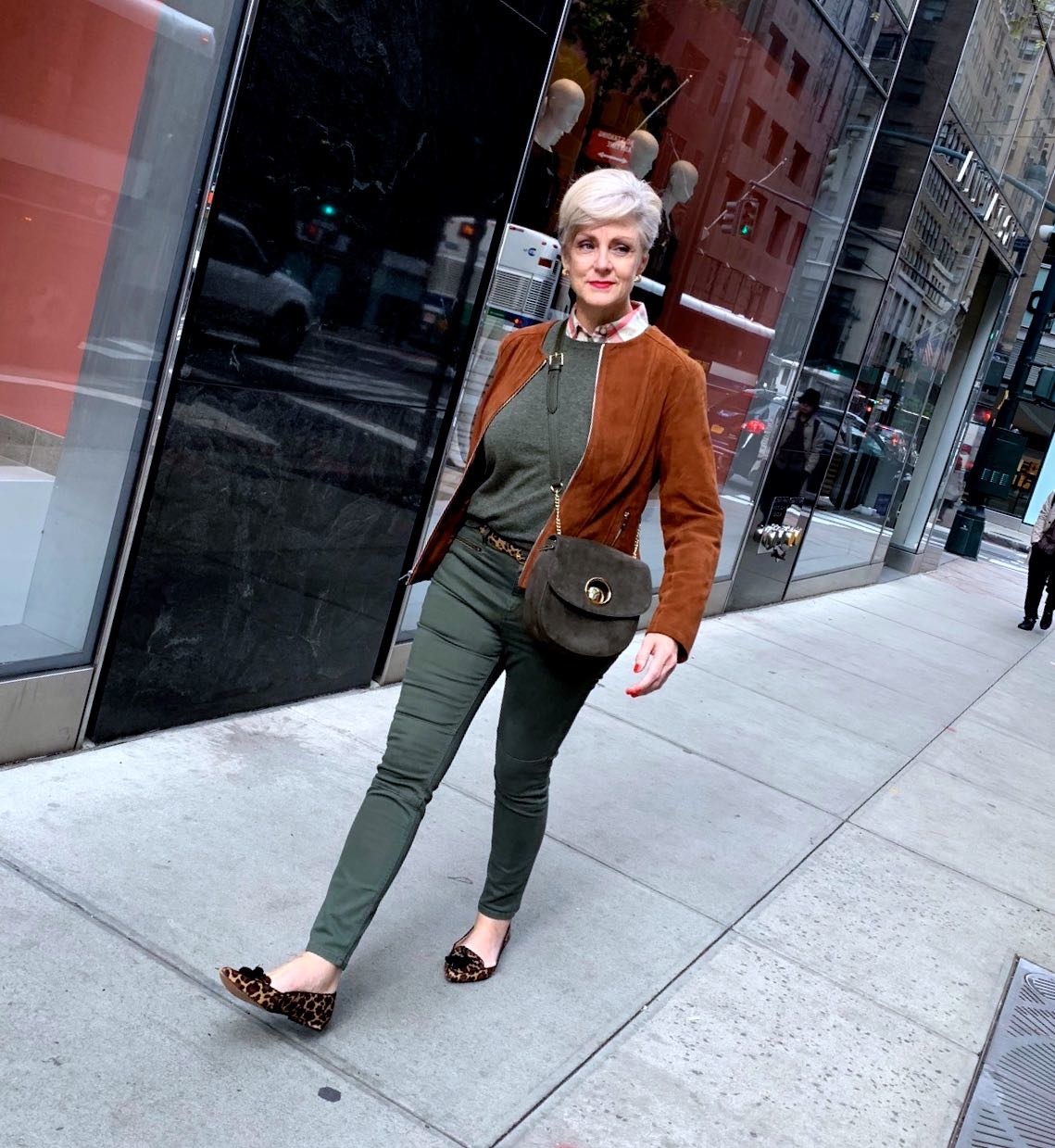 brown suede jacket, green cashmere sweater, leopard flats