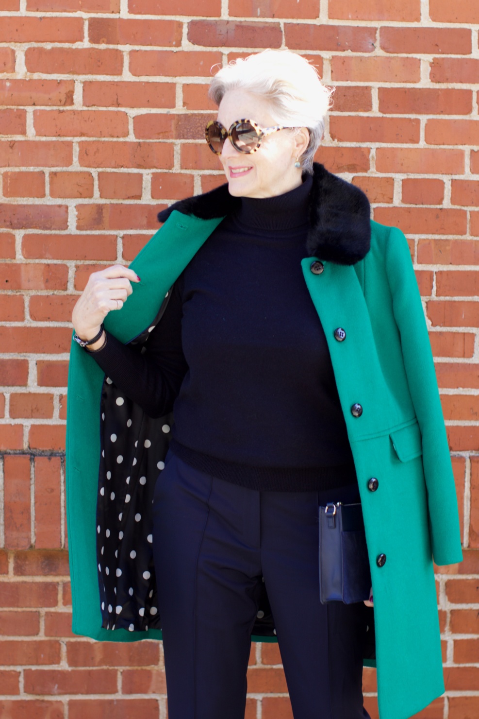 beth from Style at a Certain Age wears an Everlane cashmere turtleneck, Italian weave ankle pants, leopard pumps, and Talbots green overcoat