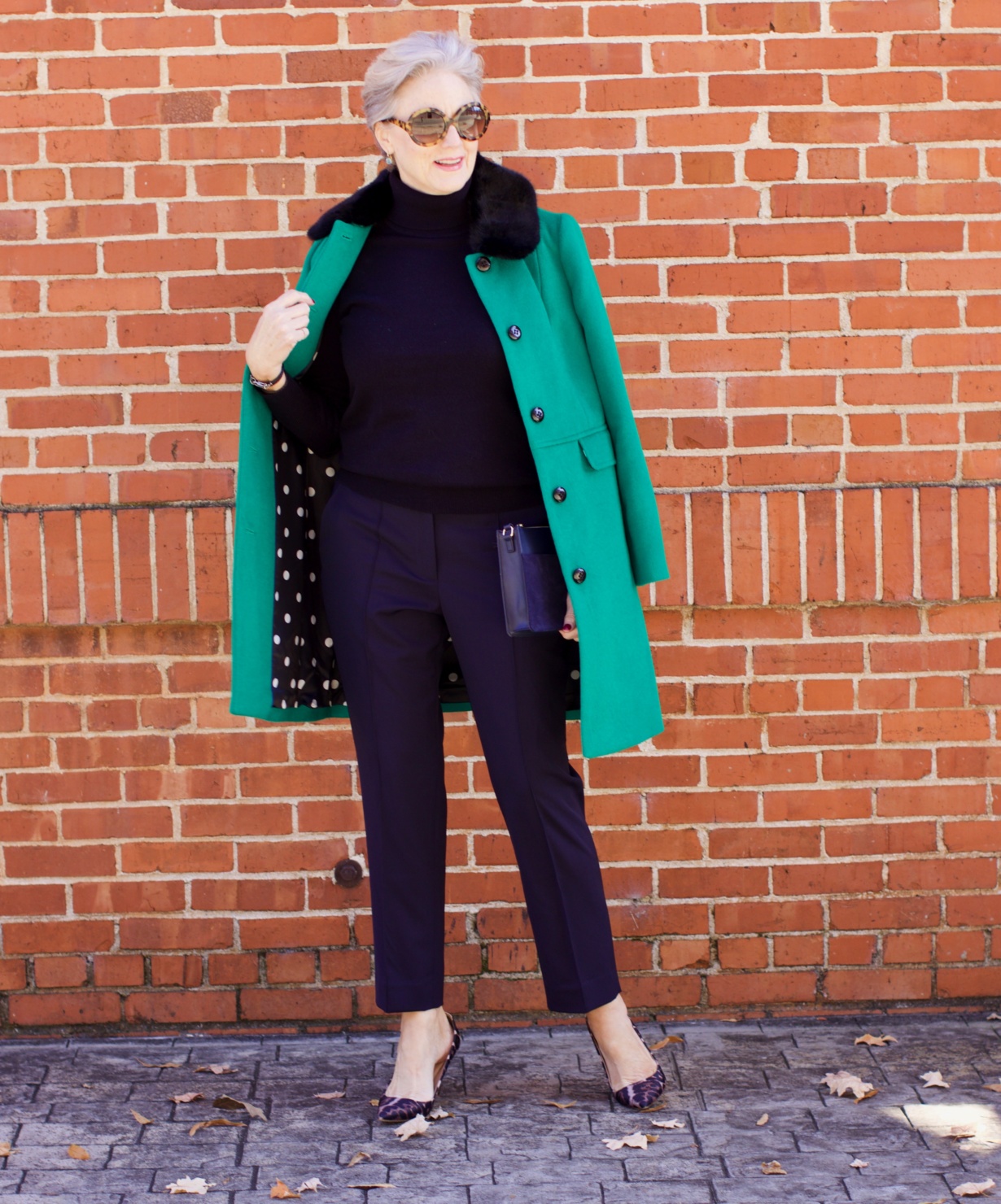 beth from Style at a Certain Age wears an Everlane cashmere turtleneck, Italian weave ankle pants, leopard pumps, and Talbots green overcoat