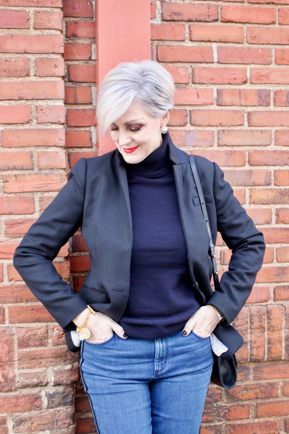 beth from style at a certain age wears tuxedo denim from Ann Taylor, cashmere turtleneck from Everlane and Parker blazer from J.Crew