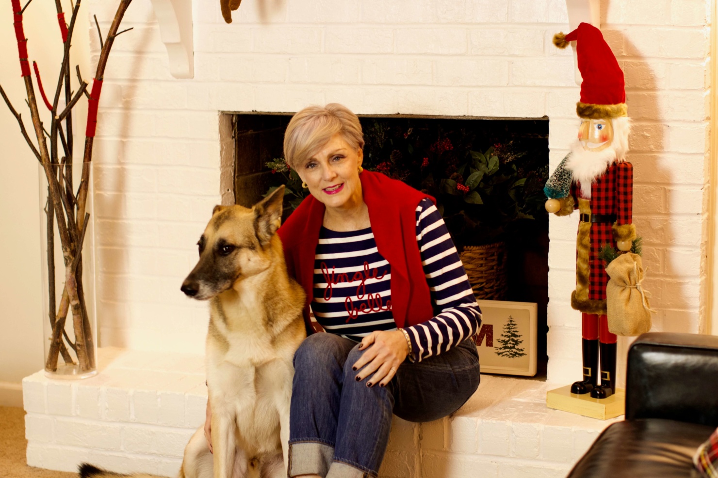 beth from Style at a Certain Age wears a Talbots jingle belle striped tee, J.Crew jeans, and embroidered smoking slippers