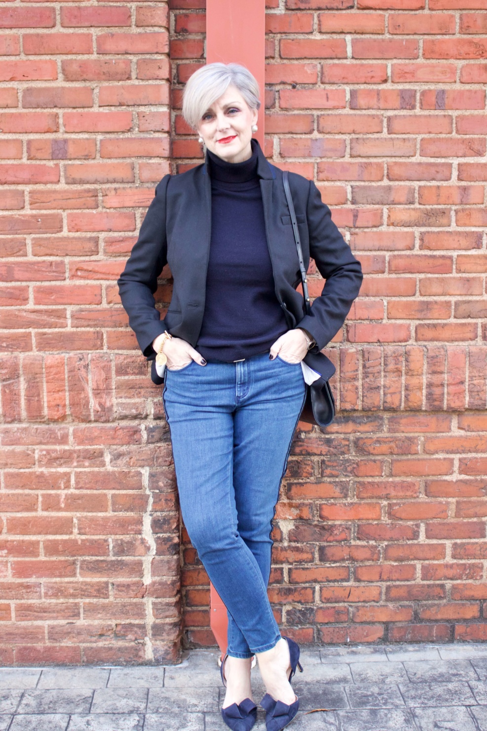 beth from style at a certain age wears tuxedo denim from Ann Taylor, cashmere turtleneck from Everlane and Parker blazer from J.Crew