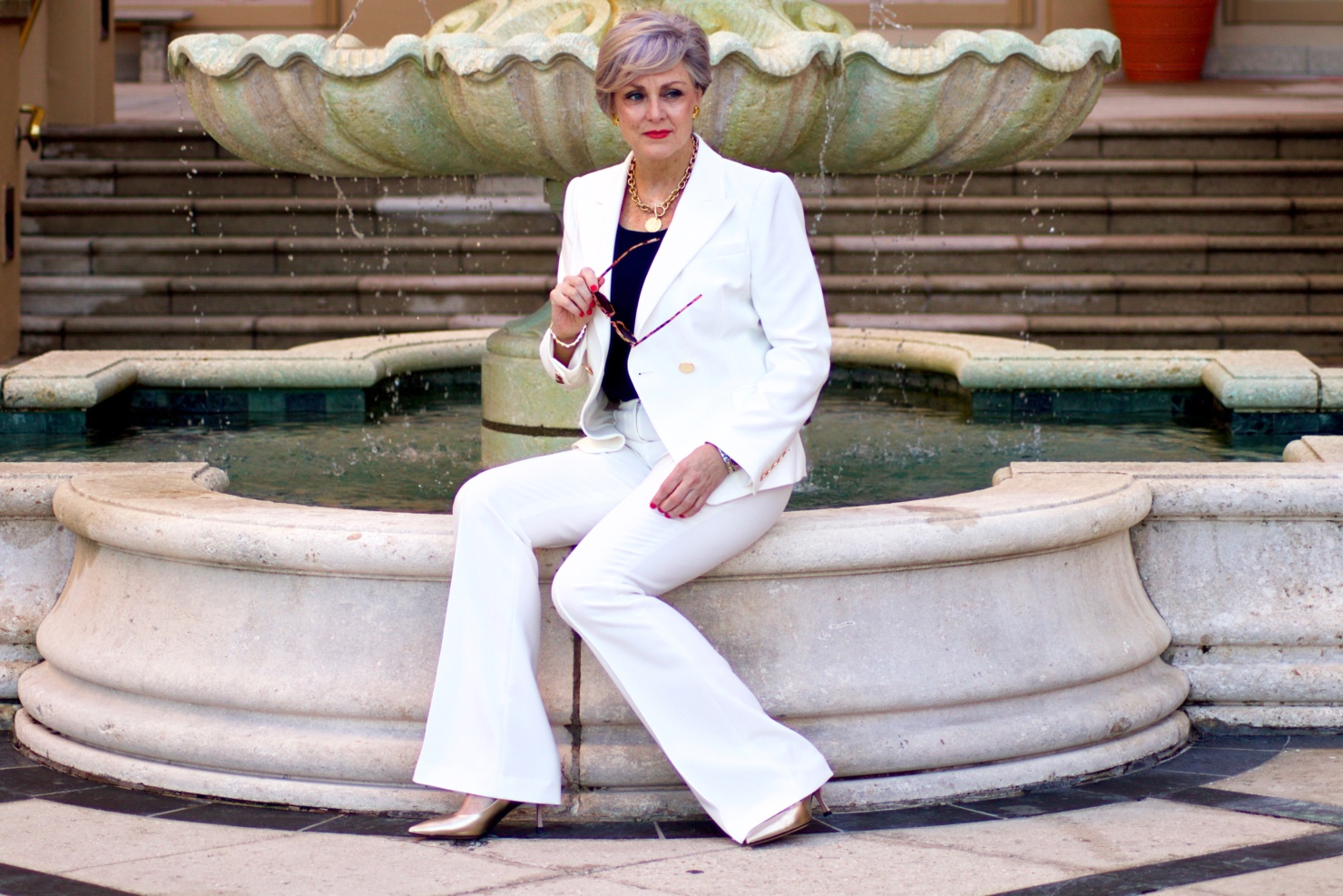 beth from Style at a Certain Age wears a Kobi Halperin ivory structured blazer, ivory trouser pant from Halsbrook