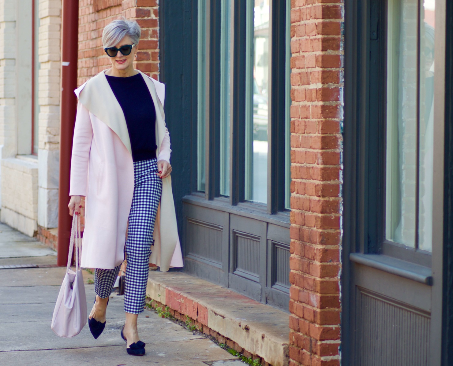 beth from Style at a Certain Age transitions to Spring wearing J.Crew gingham pants, Michael Stars blouson knit top, Misook knit topper and navy suede pumps