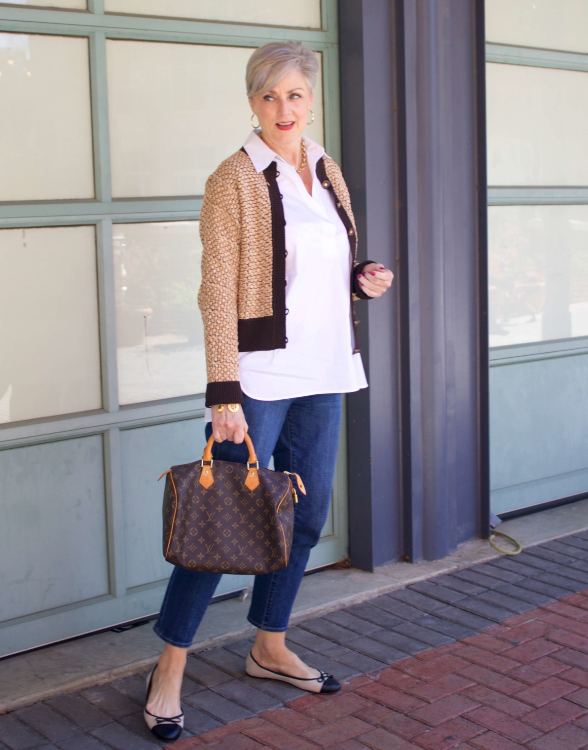 beth from Style at a Certain goes shopping  wearing a Lafayette 148 white shirt, St. John Sport sweater, girlfriend jeans, and ballet flats