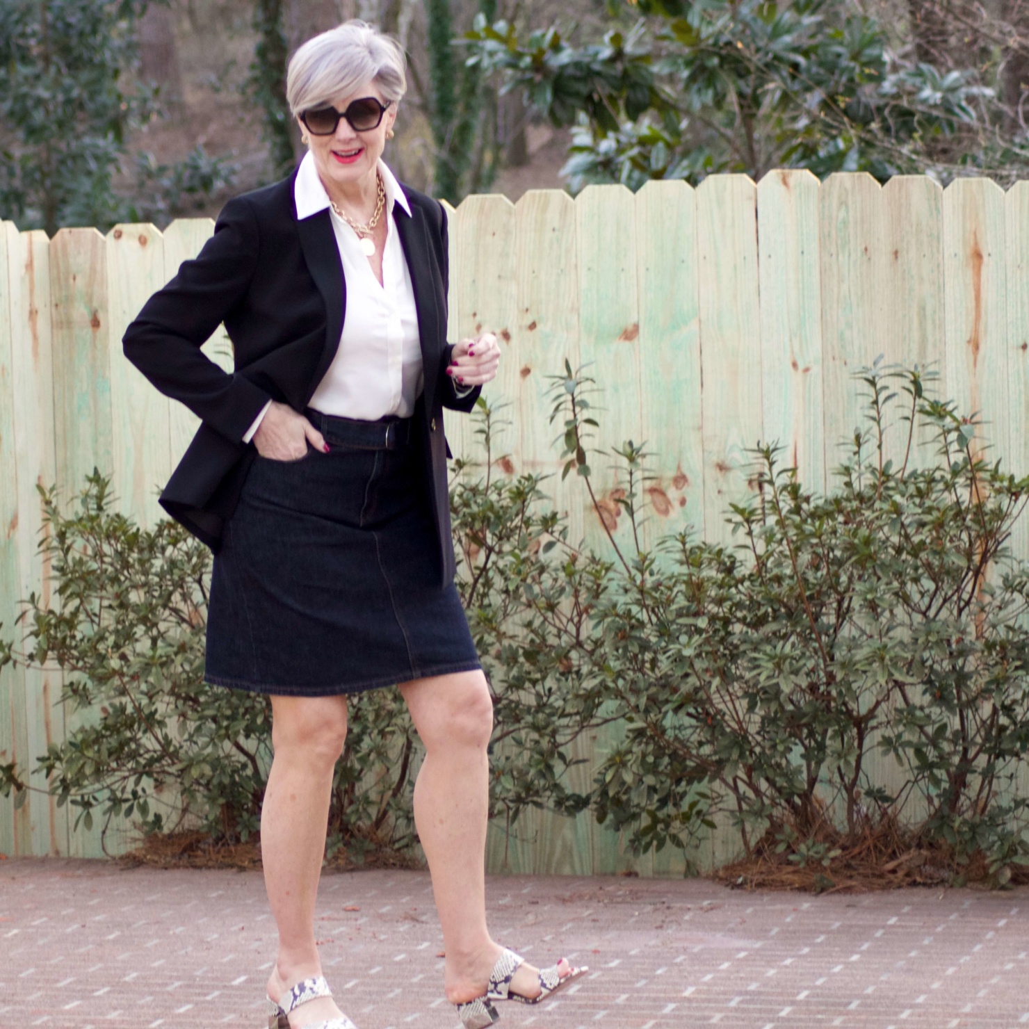 beth from Style at a Certain Age wears Ann Taylor denim skirt, white essential blouse, black blazer and snake print sandals