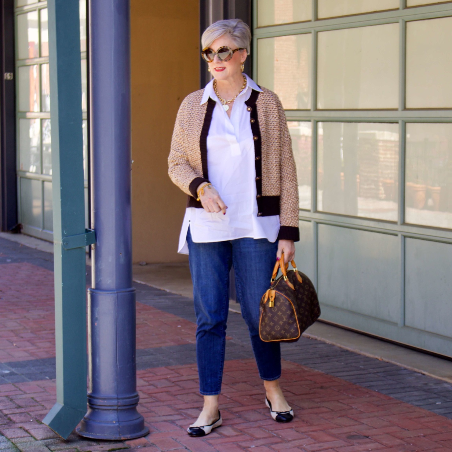 beth from Style at a Certain goes shopping  wearing a Lafayette 148 white shirt, St. John Sport sweater, girlfriend jeans, and ballet flats