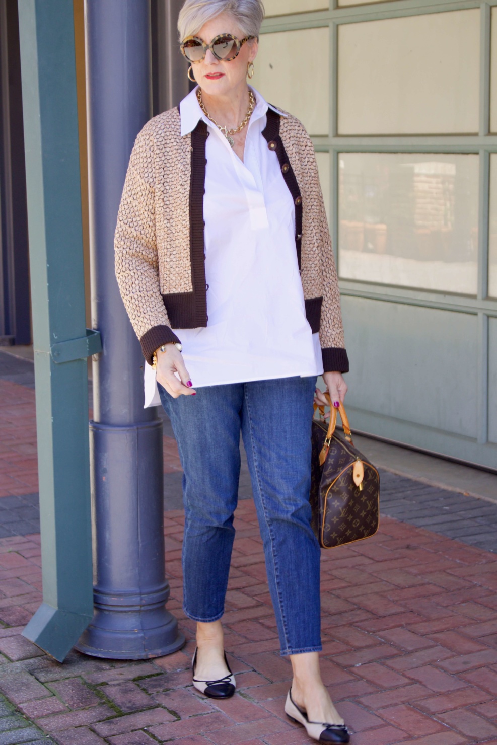 beth from Style at a Certain goes shopping  wearing a Lafayette 148 white shirt, St. John Sport sweater, girlfriend jeans, and ballet flats