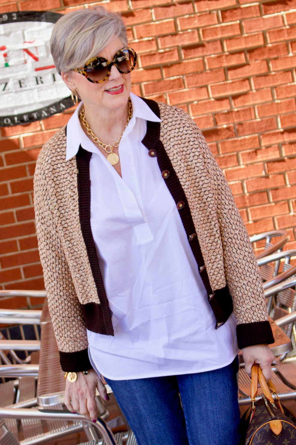 beth from Style at a Certain goes shopping  wearing a Lafayette 148 white shirt, St. John Sport sweater, girlfriend jeans, and ballet flats