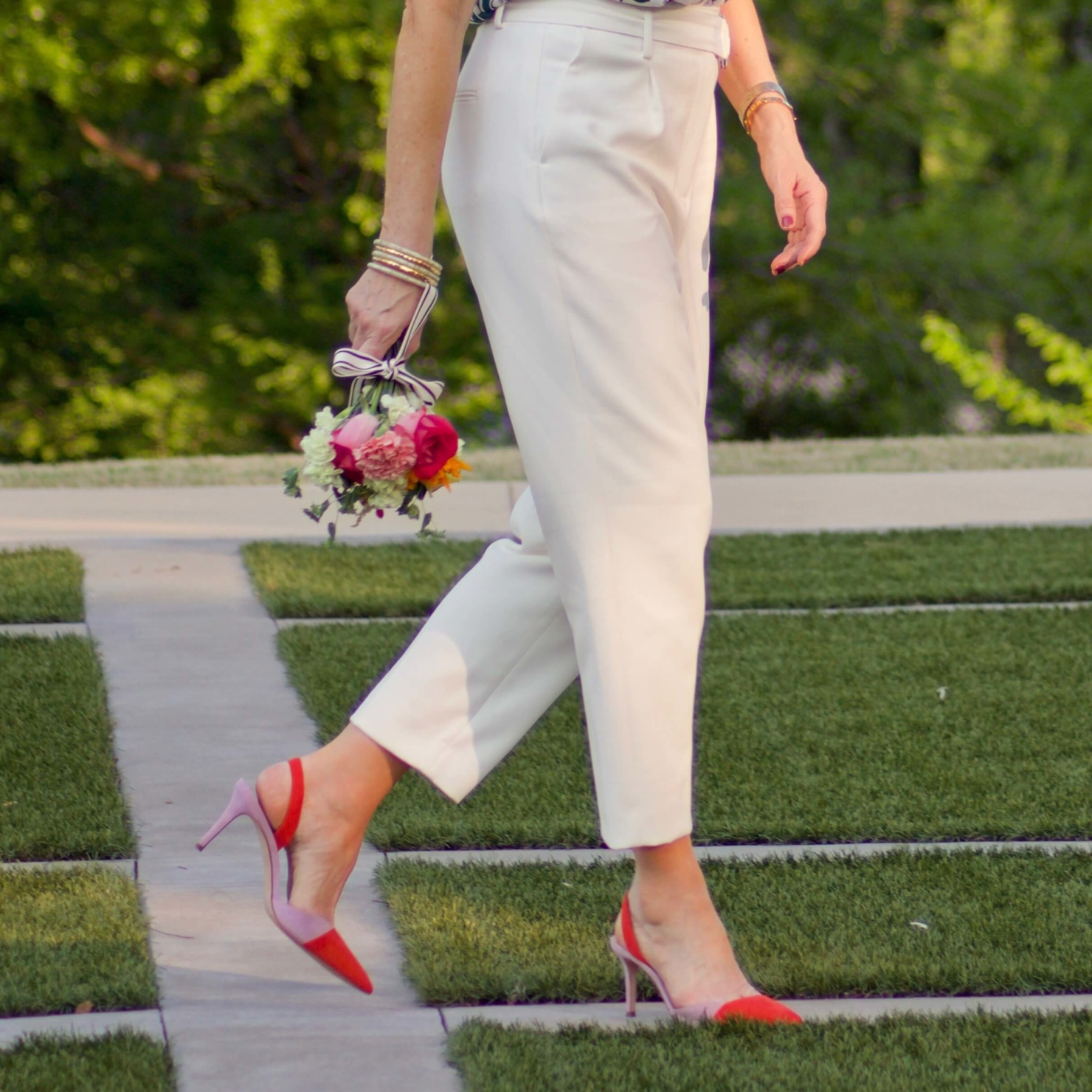 beth from Style at a Certain Age wears Ann Taylor pleated pants and suede slingbacks