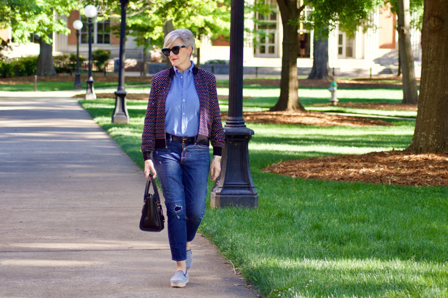 beth from Style at a Certain Age wears high low St. John sweater, J.Crew blue jeans, Ralph Lauren button down, Sam Edelman espadrilles