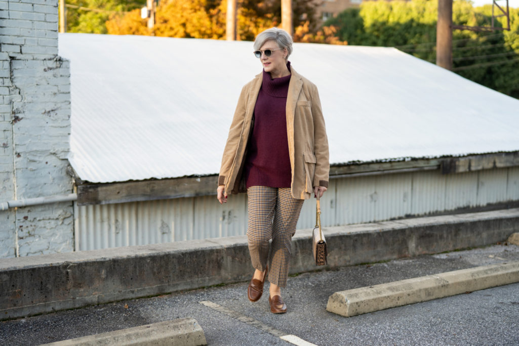 check pants and burgundy sweater