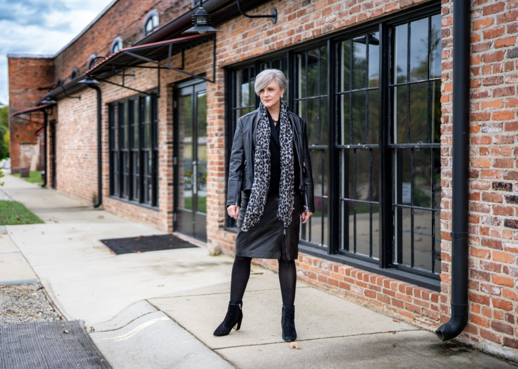 cashmere, a black leather skirt and leopard scarf