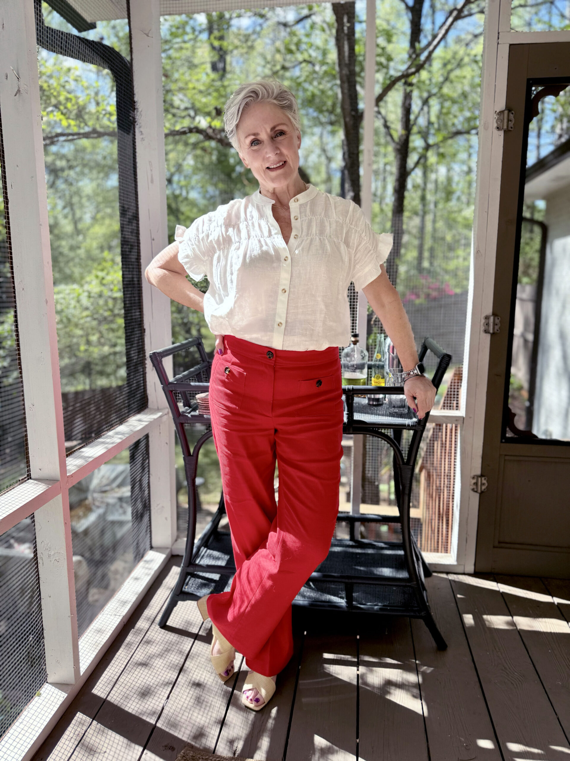 red pants white top