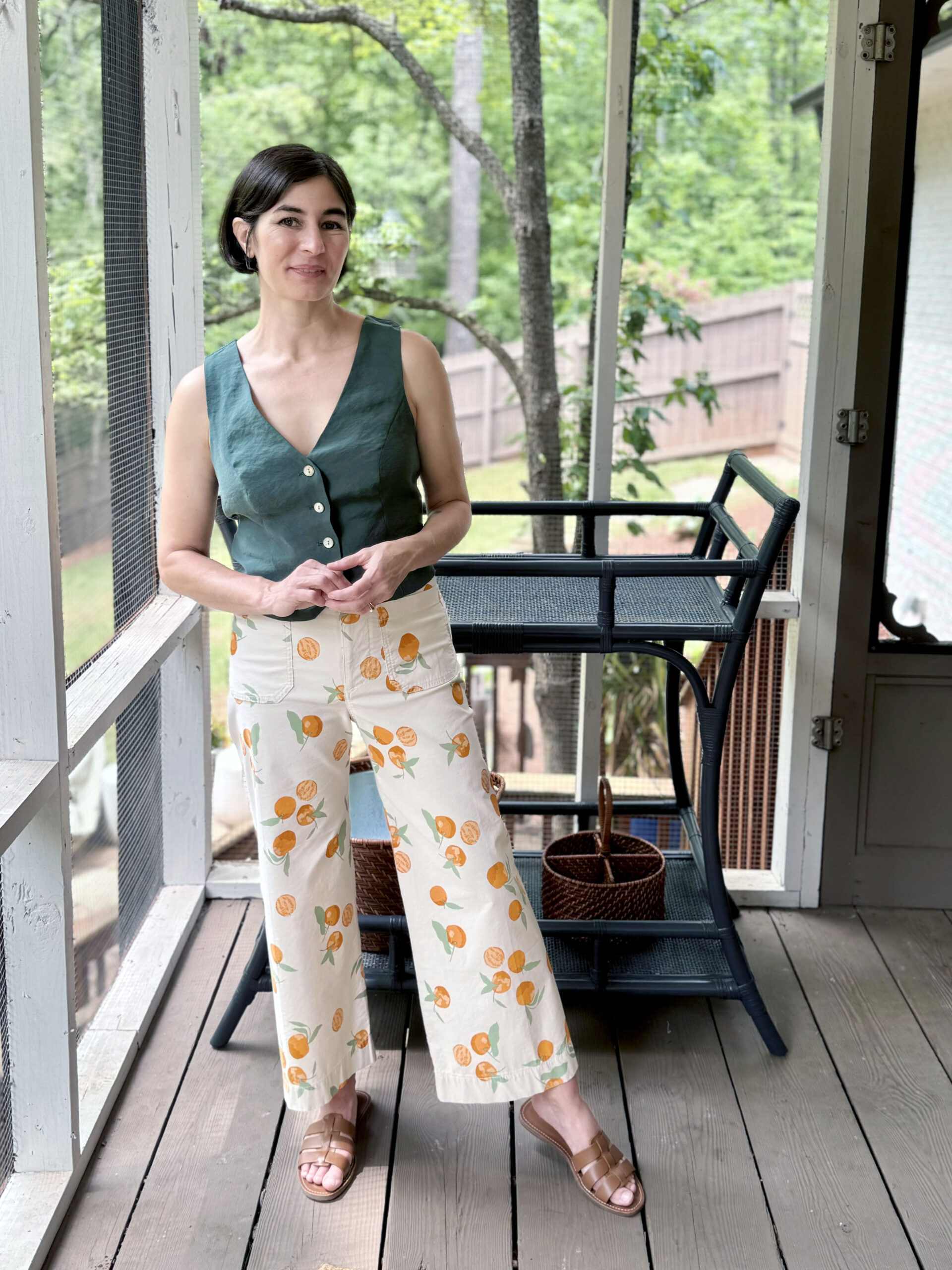 orange trousers and vest outfit