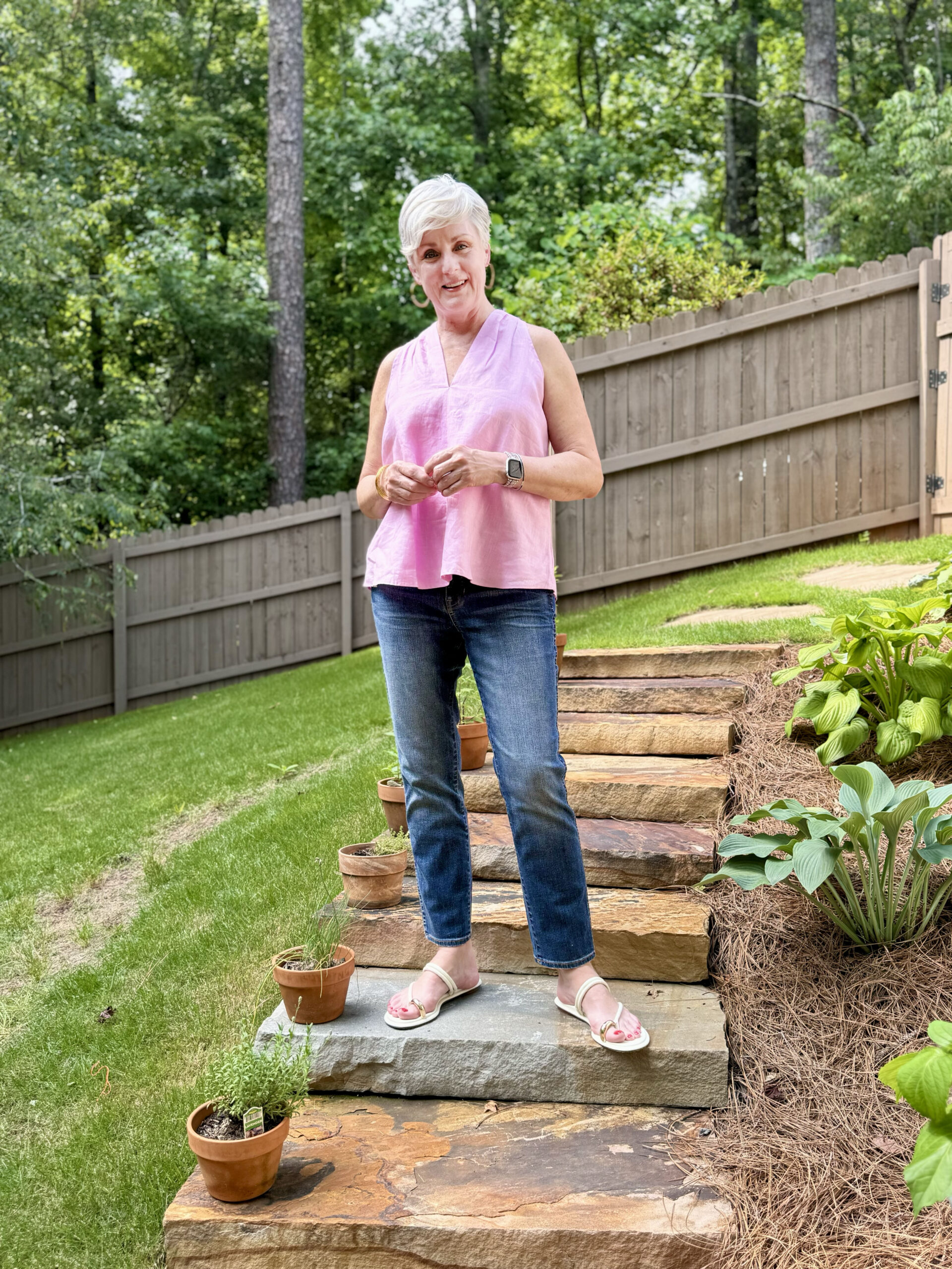 pink linen top with jeans